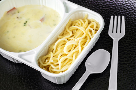 spaghetti carbonara with ham in the packageの写真素材