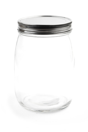 Empty glass canister in white backgroundの写真素材
