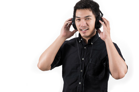 Isolated asian man with headsetの写真素材