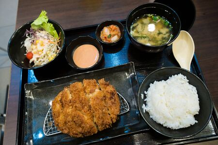 Fried pork and japanese rice in the bento setの写真素材