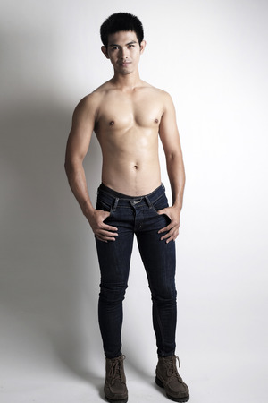 Portrait of Asian male model shirtlessの写真素材