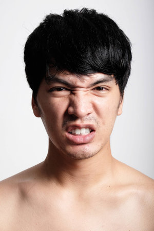 Headshot of Asian man face with no makeupの写真素材