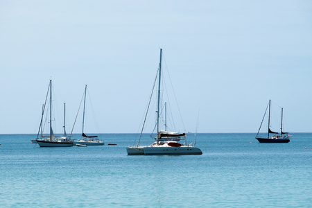 white yacht floating in the ocean - Phuket, Thailandの写真素材