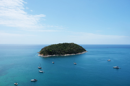 white yacht floating in the ocean - Phuket, Thailandの写真素材