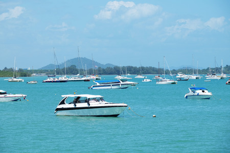 white yacht floating in the ocean - Phuket, Thailandの写真素材