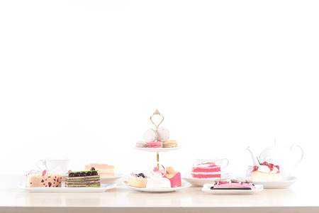 Beautiful cake and dessert on wooden table in pastel color - soft focusの写真素材