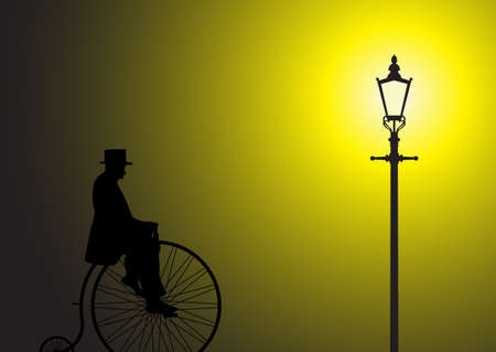 A silhouette of a gentleman on a penny farthing in the light of a street lampのイラスト素材