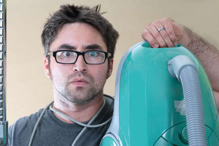 An ethnic male who looks like a wacky repairman.の写真素材