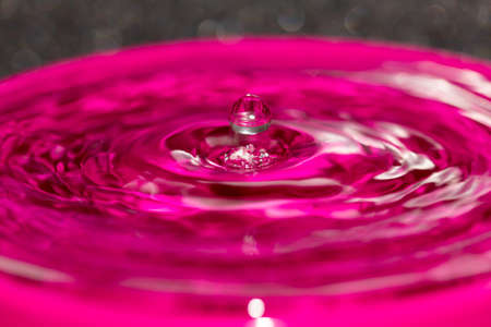 Water sphere just about to enter and make a splashの写真素材