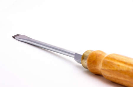 A screwdriver with a selective focus on white background.の写真素材