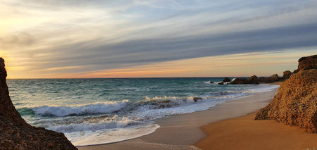 Sunset on the beach of Cadiz in Spainの写真素材