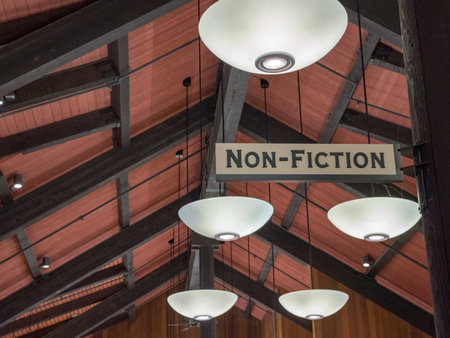 Non-fiction sign overhanging cabin library