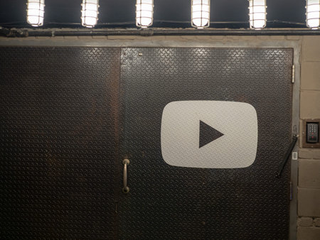 YouTube logo on steel door entrance to Chelsea Market location