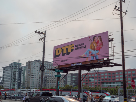 DTF Down to fall head over heels OkCupid online dating billboard advertisementのeditorial素材