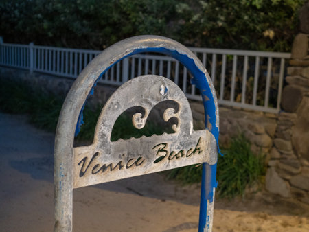 Venice beach Los Angeles sign and post at nightのeditorial素材