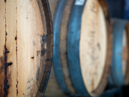Close up of aged sealed barrels containing various wines in cellarの写真素材
