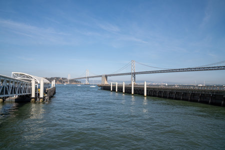 Empty ferry docking station in front of the Bay Bridge in California leading to Oakland
