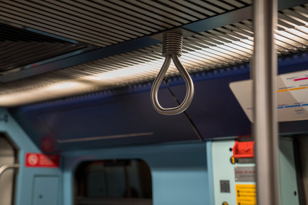 Steel handle safety and stability bar in public transit subway system