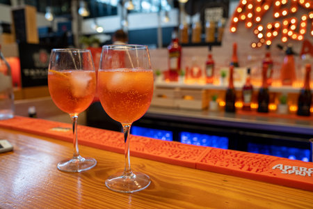 Two Aperol Spritz cocktails on bar counter at Time Out Market Lisbonのeditorial素材