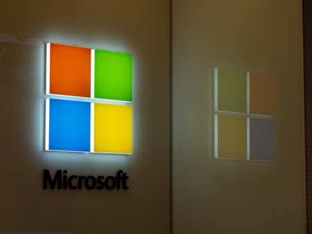 Microsoft logo and reflection outside of Microsoft Store location
