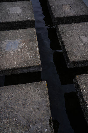 square concrete slabs of the bridgeの写真素材