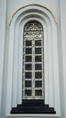 A high, narrow window in the church