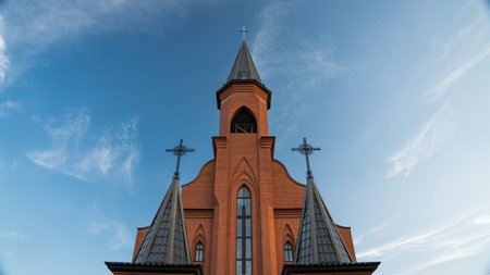 The domes of the church. The red brick masonry of the churchの写真素材