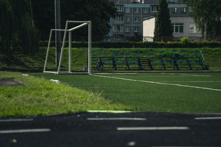 The school stadium, football gates on the field. Rubber Treadmillの写真素材