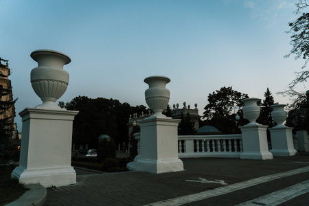 Concrete columns with capitals and bases on them. Entrance to the parkの写真素材