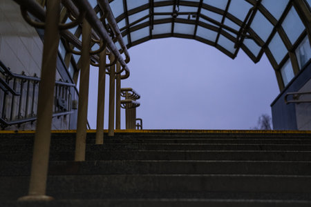 Exit from the underpass in the evening. Cloudy sky. Steps upの写真素材