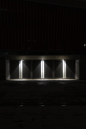 Gate lighting at night, entrance to the stadium. Minimalismの写真素材