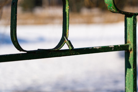 Iron, old handrails with a lock on them. Love lock on the railing. High quality photoの写真素材