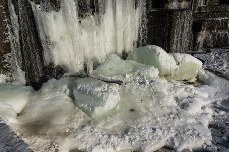 Frozen waterfall water. A frozen waterfall on a February morning. High quality photoの写真素材