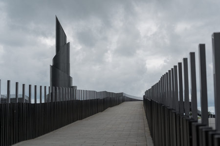Frozen fountain on the background of cloudy sky, bridge, Batumi. High quality photo