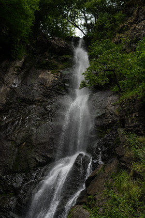 Mountain waterfall in Georgia. a weak waterfall in the mountains