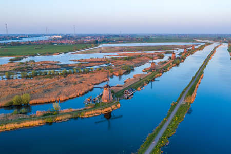 Drone view of Kinderdijk Wind Mills during sunset in rural Rotterdam area in Netherlandsの写真素材
