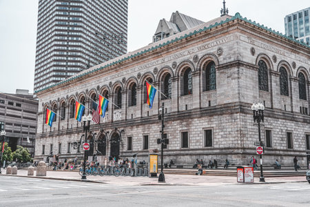 Boston, US - June 2: Rainbow flag hanging outside Boston Public Library during Pride Mounth
