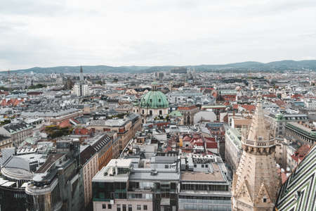 View of Peterskirche dom from the top of Stephansdom in the historic old town of Vienna, Austriaの写真素材