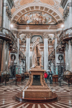 Vienna, Austria - April 28, 2019: Statue of the Emperor Charles VI is at Prunksaal, inside Austrian National Libraryのeditorial素材