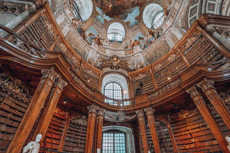 Vienna, Austria - April 28, 2019: The ceiling paintings at Prunksaal inside imperial libraryのeditorial素材