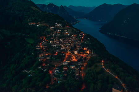 Aerial drone shot view of Bre Sopra, swiss village on Monte Bre in Lugano, Switzerlandの写真素材