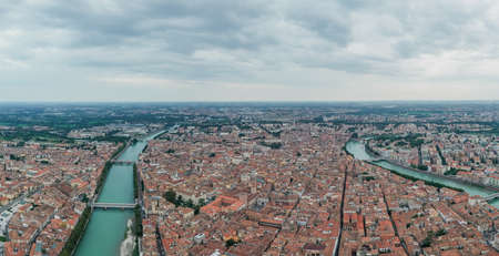 Aerial panarama drone shot of Verona medieval city from Castel Pietroの写真素材