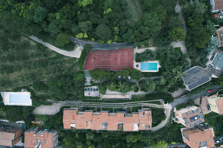 Overhead aerial drone shot of red brick villas in Castel San Pietro, Veronetta, Verona, Italyの写真素材