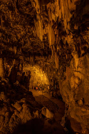 Kefalonia, Greece - August 22, 2019: Tourists inside stalactite Drogarati caveのeditorial素材