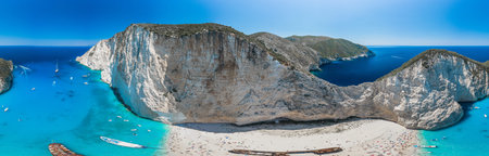 Aerial panorama drone shot of Zakynthos north end with Navagio beach and yachts in Ionian sea