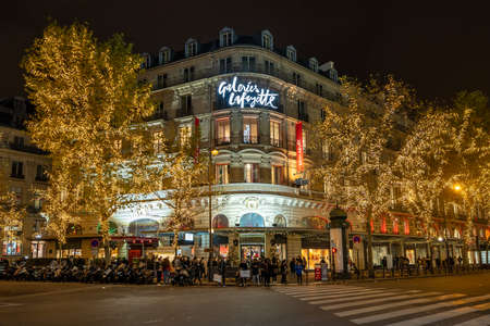 Paris, France - December 1, 2019: Facade of Gelleries Lafayette on boulevard Haussmann with holiday lightingsのeditorial素材