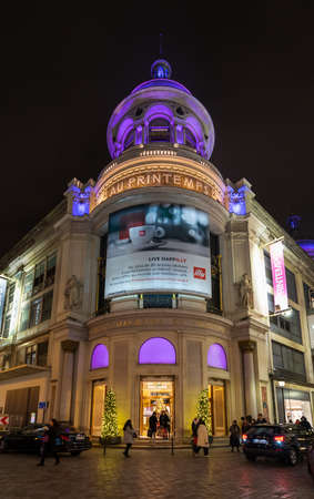 Paris, France - December 1, 2019: Parisiens walk out of printemps shopping mallのeditorial素材