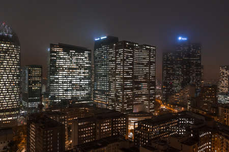 Paris, France - December 5, 2019: Aerial drone night shot of Skyscrapers Tour Thales, Tour Total, Tour Deloiettes in La Defense financial districtのeditorial素材