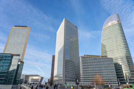 Paris, France - December 8: La Defense skyline of TechnipFMC, MACSF, EGEE and Engie in the sunset sun lightのeditorial素材