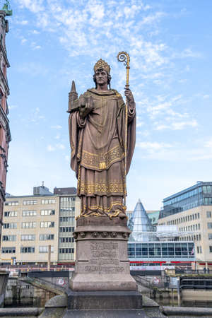 The historic bishop Ansgar statueon Trostbrucke bridge in Hamburg, Germanyの写真素材